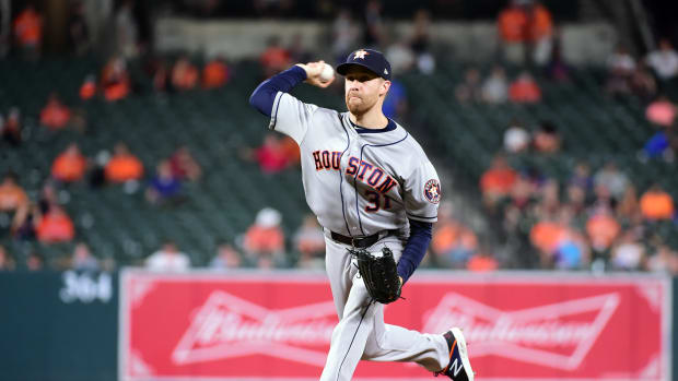 Aug 10, 2019; Baltimore, MD, USA; Houston Astros pitcher Collin McHugh (31) throws a pitch in the ninth inning against the Baltimore Orioles at Oriole Park at Camden Yards.